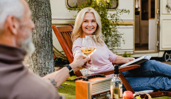 Senior married caucasian couple toasting with glasses of wine Senior married caucasian couple toasting with glasses of wine, Why you should sell your backyard